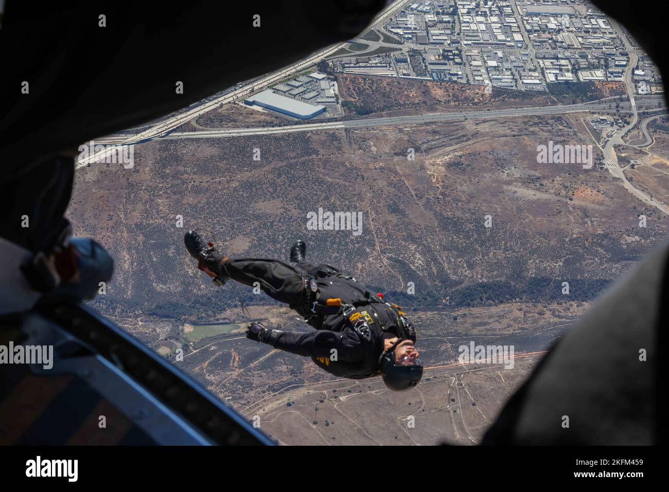 A Member Of The U S Army Parachute Team Conducts A Demonstration At