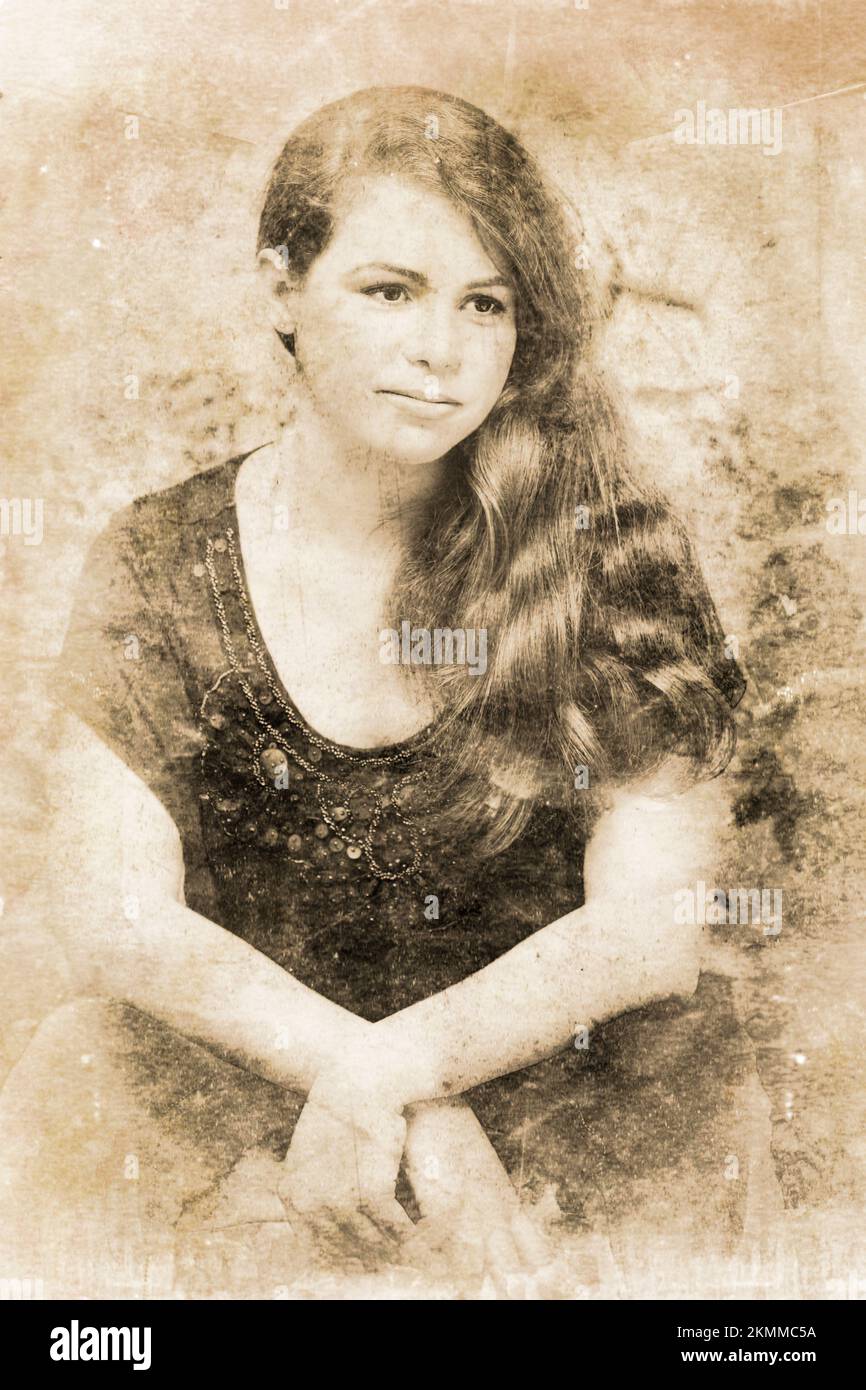 Scratched Faded And Textured Photograph Of A Vintage Lady From A Past