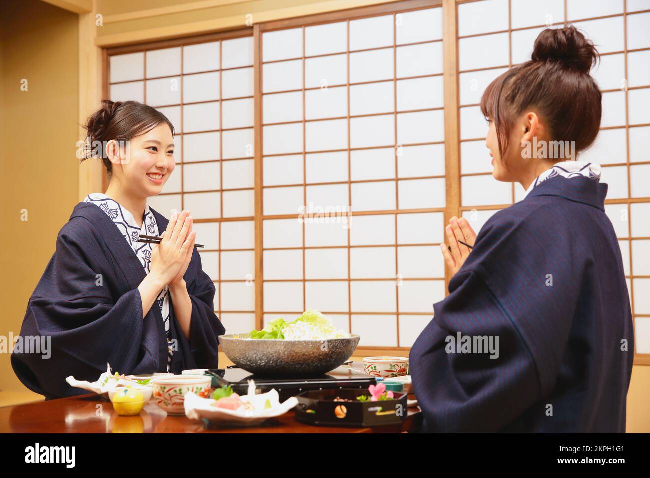 Japanese Women Having Dinner At A Hot Spring Inn Stock Photo Alamy