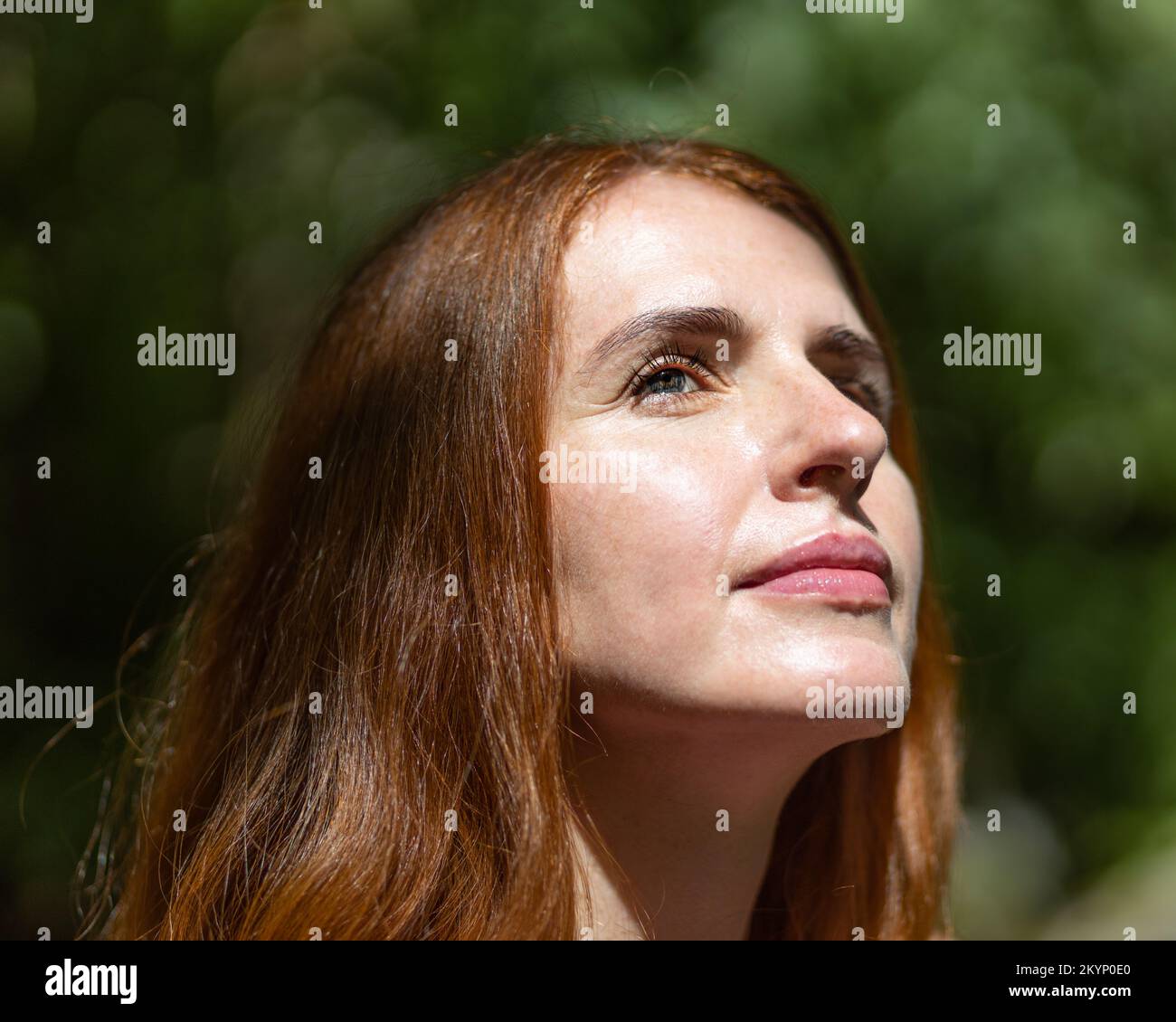 Close Up Portrait Of A Mature Light Eyed Red Haired Beautiful Middle