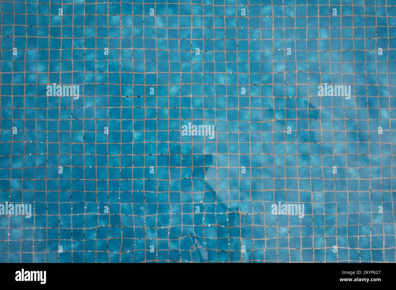 Clean Blue Square Pool Tiles Under Pool Water Background Stock Photo