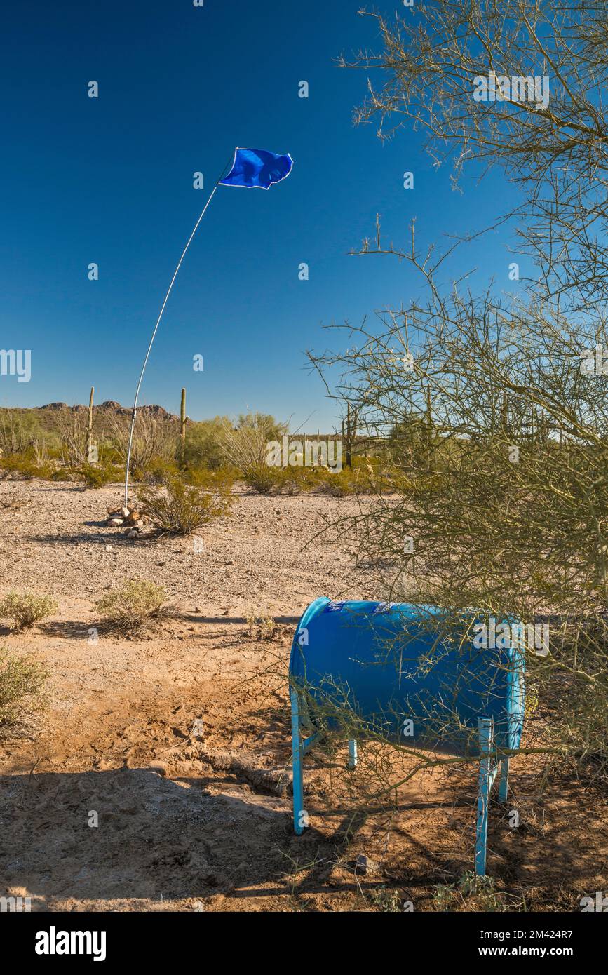 Water Barrel Marked With Blue Flag For Migrants Walking Across Desert