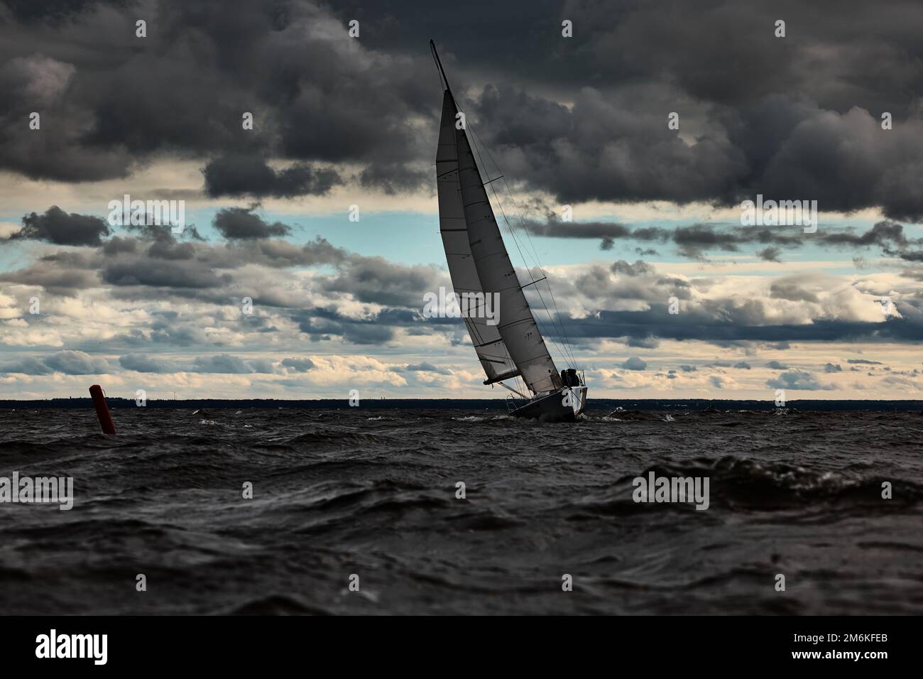 Sailboat In Sea At Stormy Weather Stormy Clouds Sky Orange Sky Sail