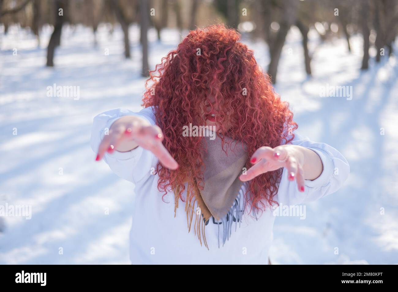 The Plump Cheeked Woman Threw Her Red Hair Over Her Face And Held Out