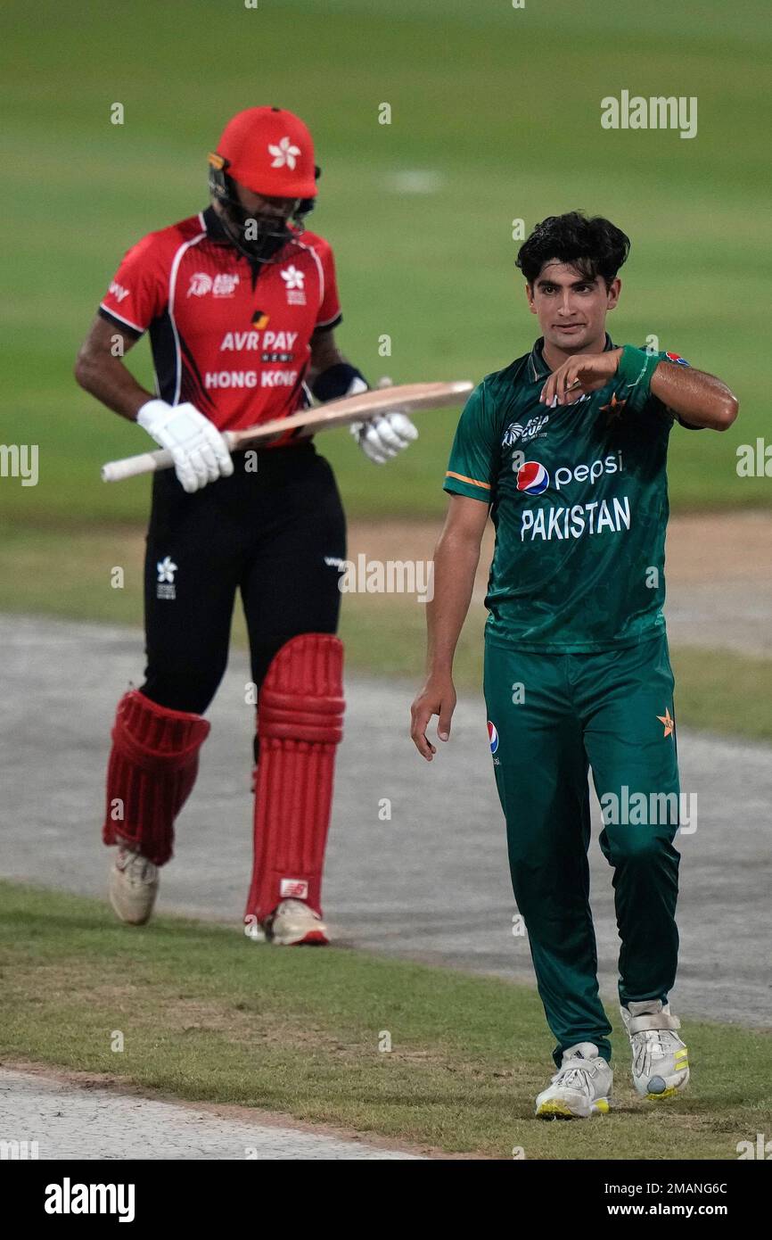 Pakistan S Naseem Shah Right Celebrates After Taking The Wicket Of