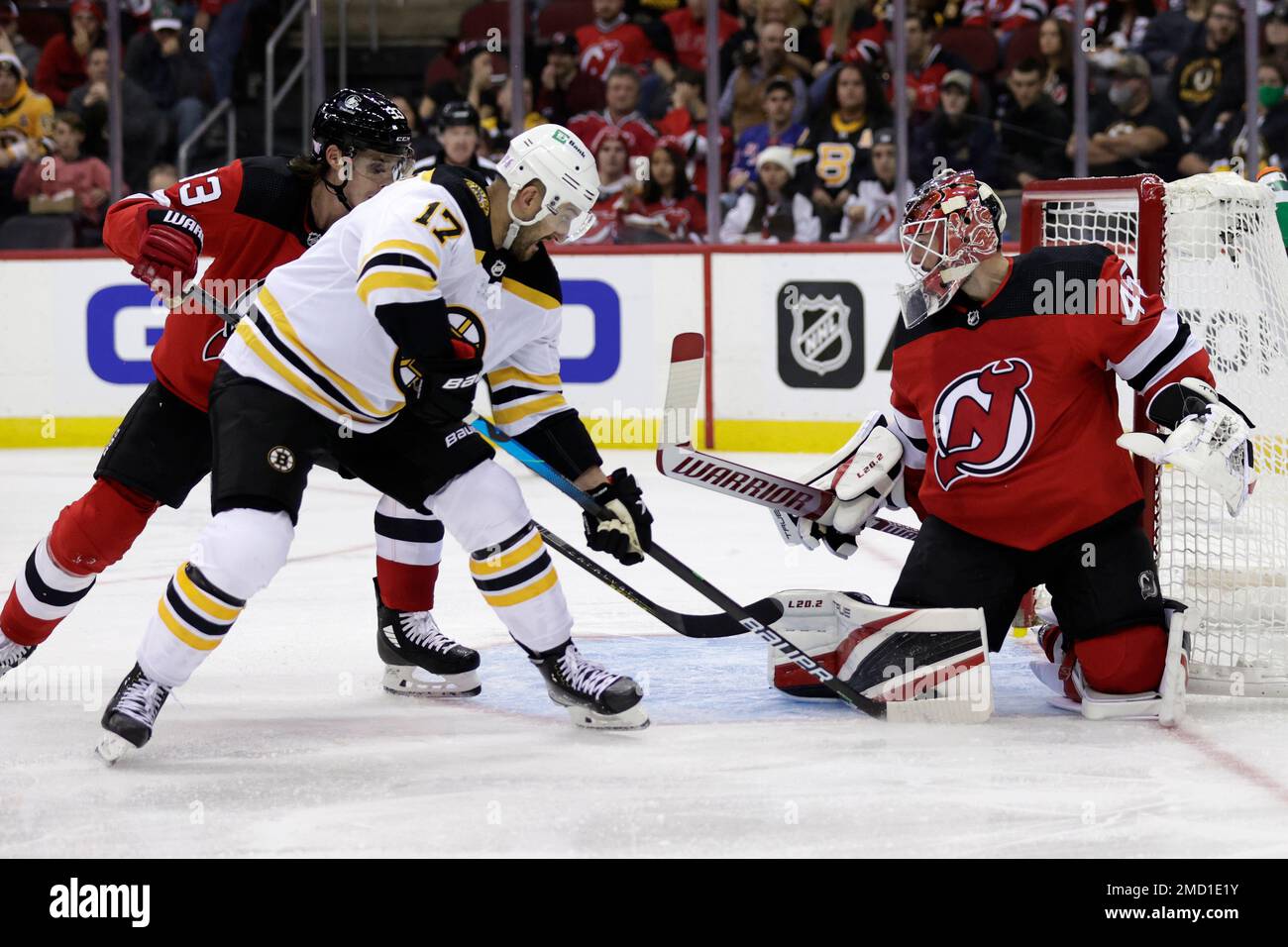 New Jersey Devils Goaltender Jonathan Bernier Stops A Shot By