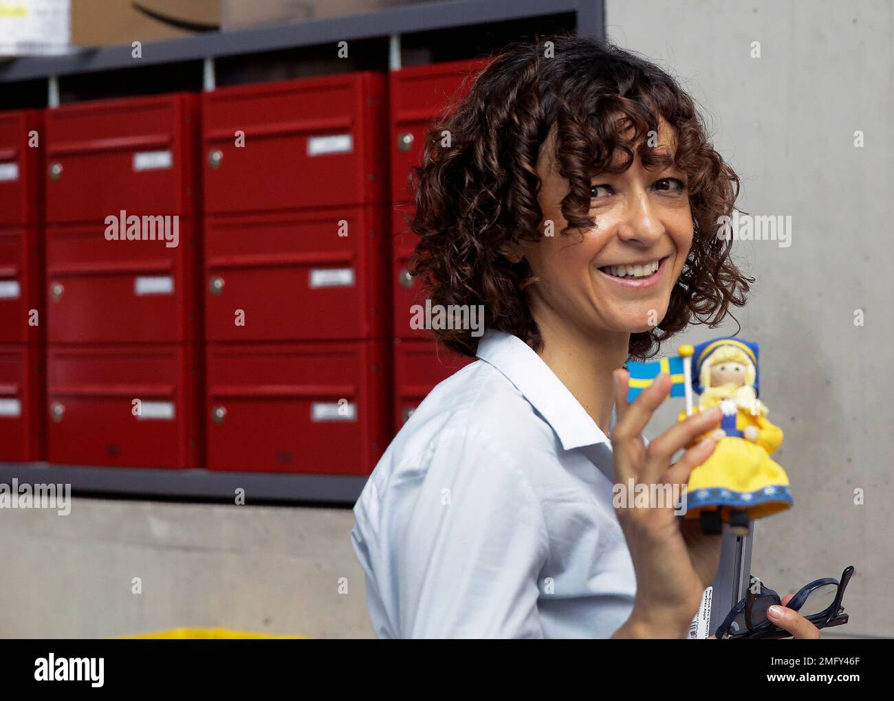 French Microbiologist Emmanuelle Charpentier Poses With A Figure With A