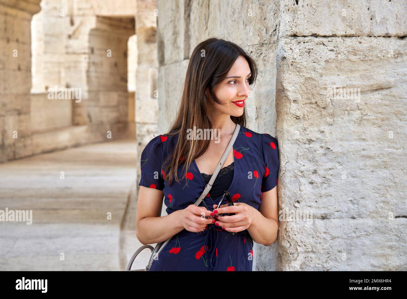 A tourist visiting les Arènes d Arles Roman Amphithéâtre Arles