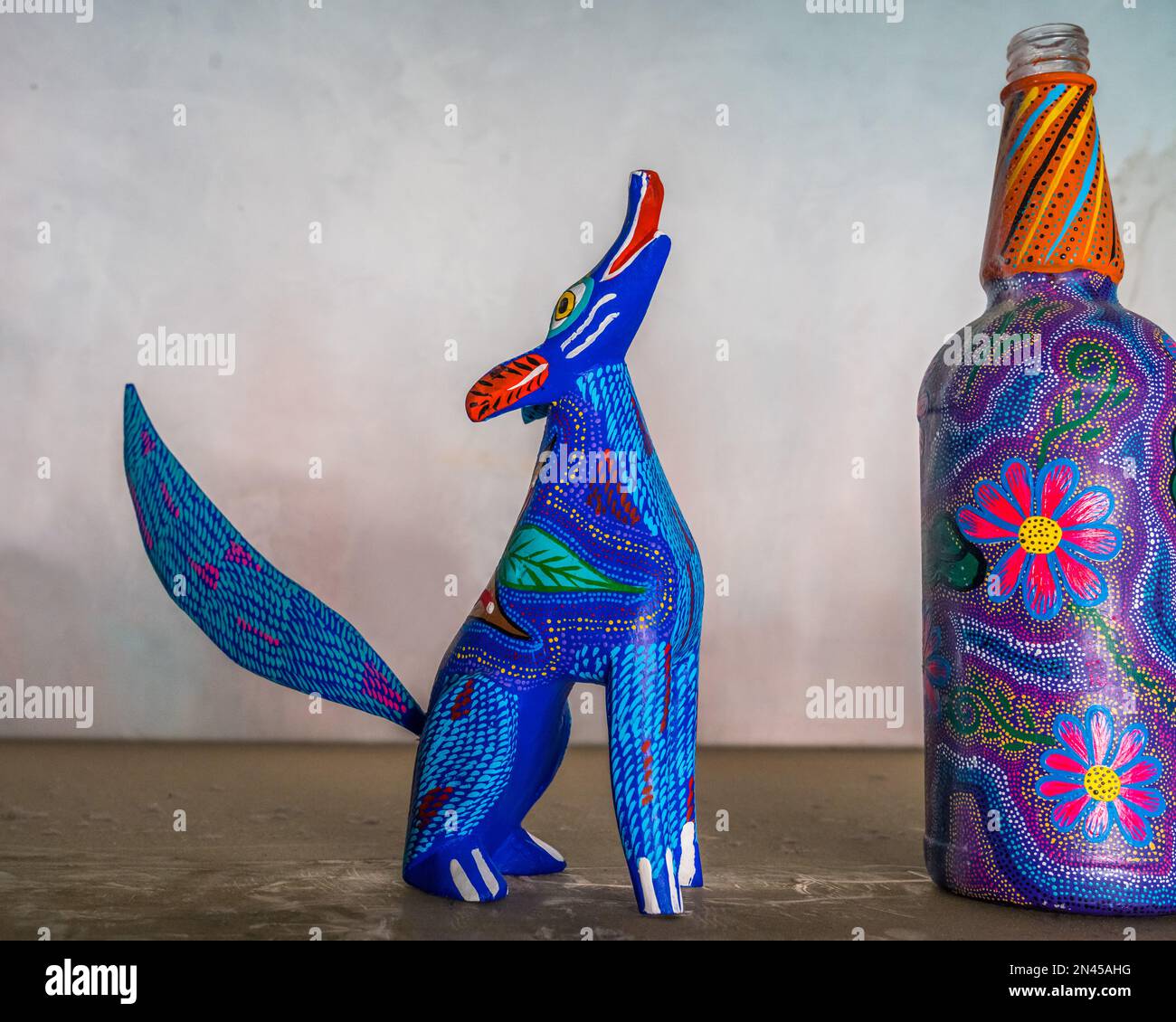 A Howling Coyote Alebrije Painted Mescal Bottle In An Artisan S Shop