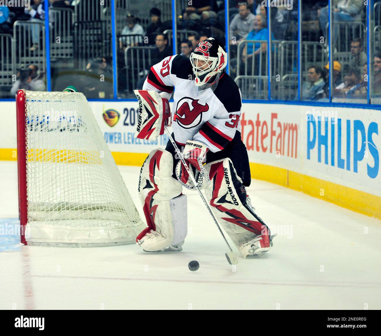 New Jersey Devils Goaltender Martin Brodeur Fields The Puck Against The