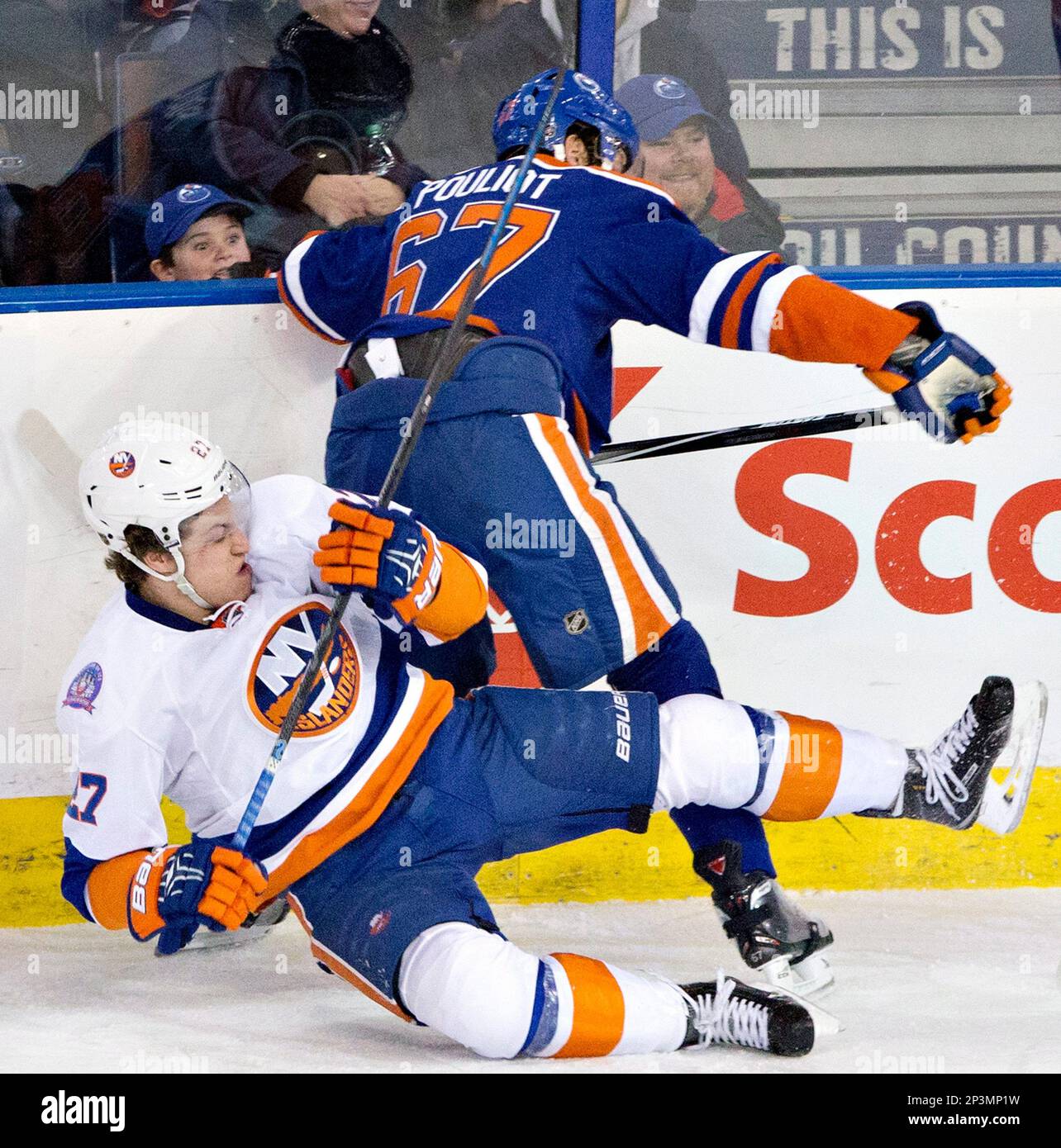 New York Islanders Anders Lee Left Is Checked By Edmonton Oilers