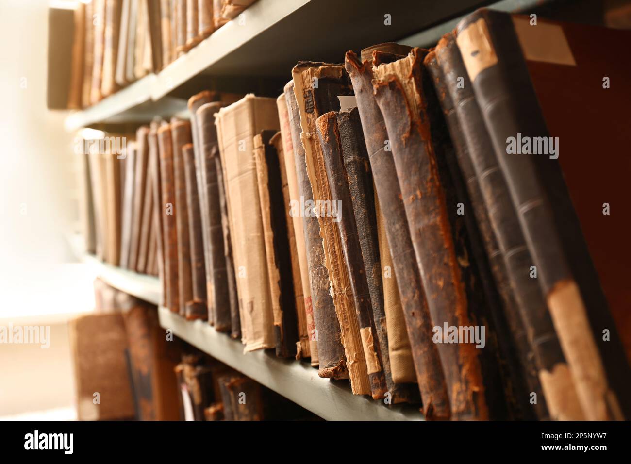 Different Old Books On Shelf In Library Closeup Stock Photo Alamy