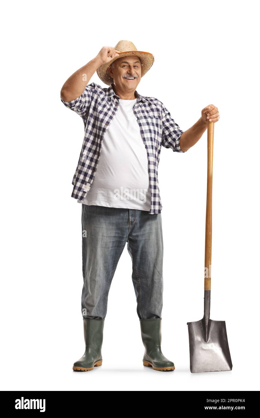 Full Length Portrait Of A Happy Mature Farmer With A Shovel Greeting