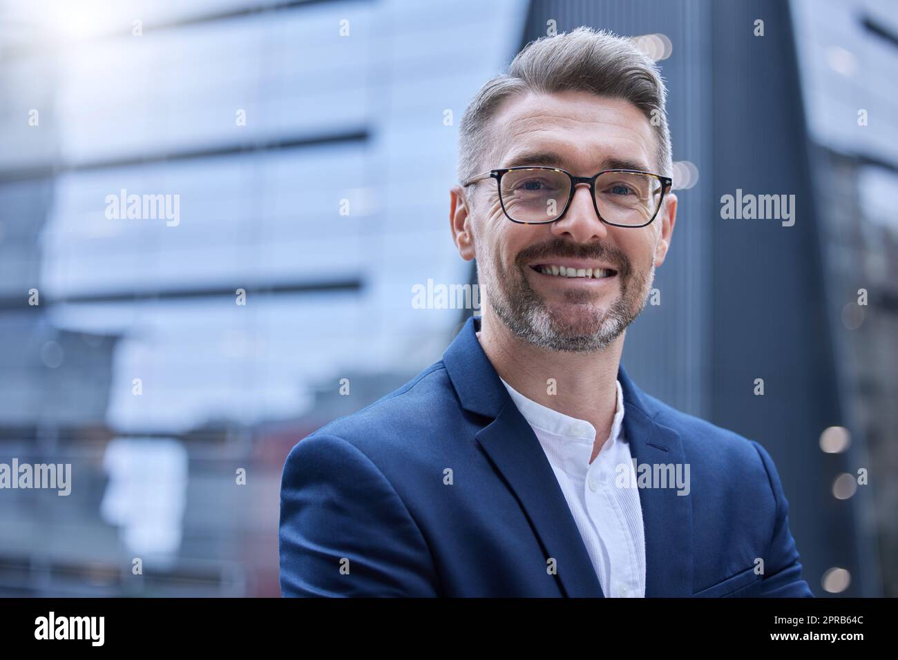 Giving You That Corporate Smile Cropped Portrait Of A Handsome Mature