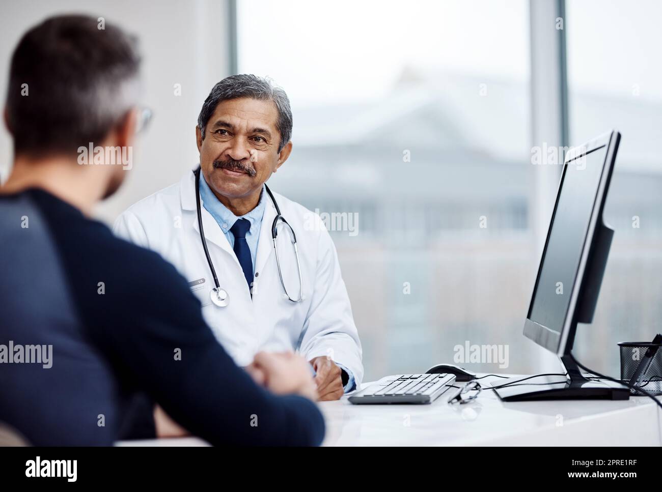 Always Here To Give You The Best Medical Advise A Cheerful Mature Male