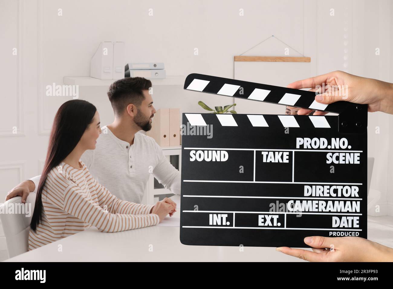 Shooting Movie Second Assistant Camera Holding Clapperboard In Front