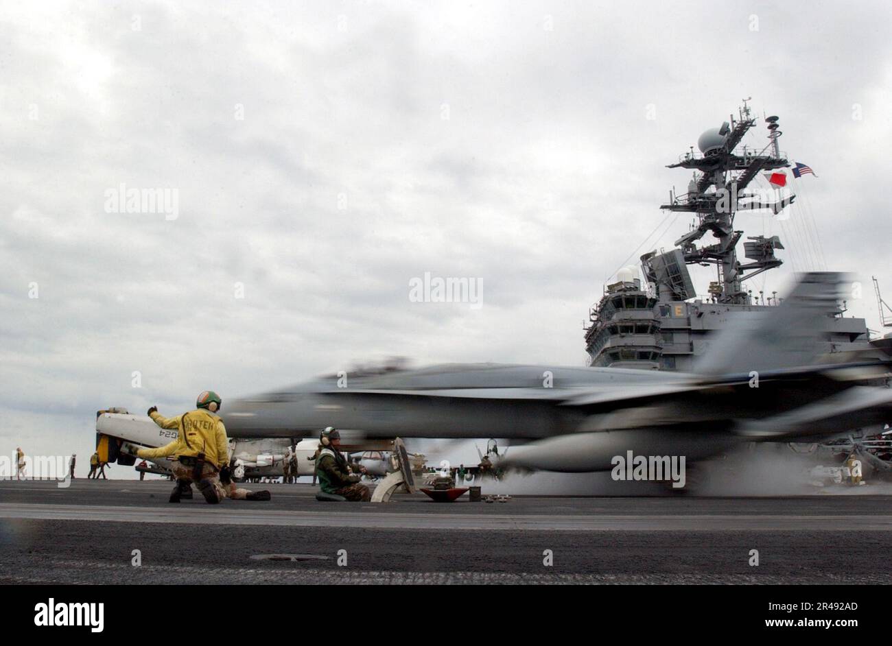 US Navy An F A 18C Hornet Launches From One Of Four Steam Driven