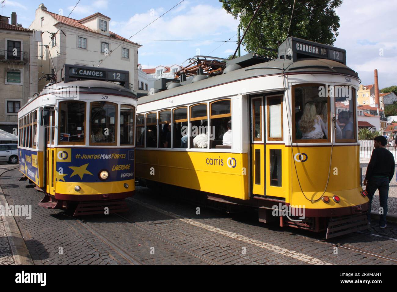 Tram Outside The Igreja De Santa Cruz In Lisboa Stock Photo Alamy