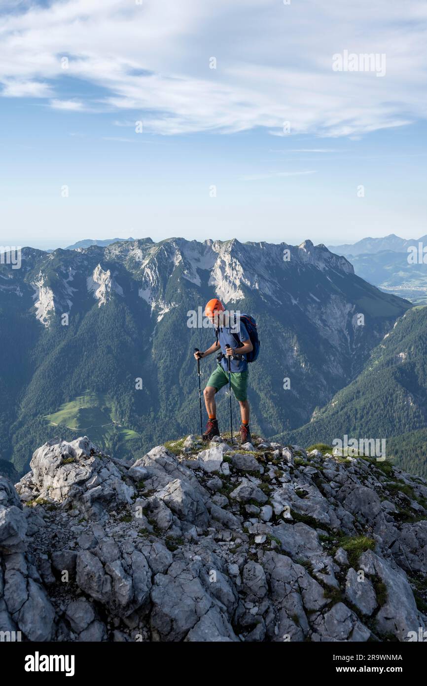 Mountaineer On A Ridge Path Crossing The Hackenkoepfe Rocky Mountains