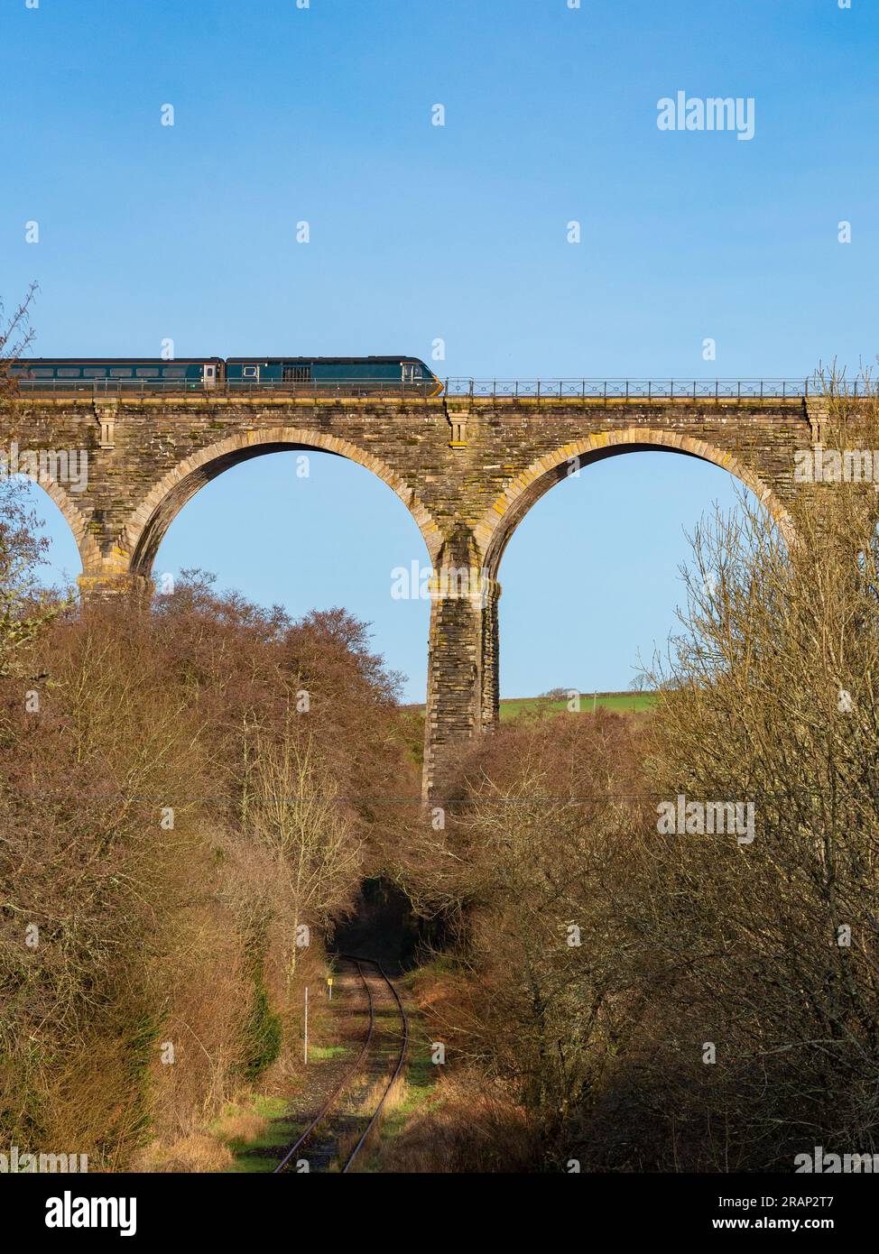 Train Travelling Over Traditional Stone Viaduct Stock Photo Alamy