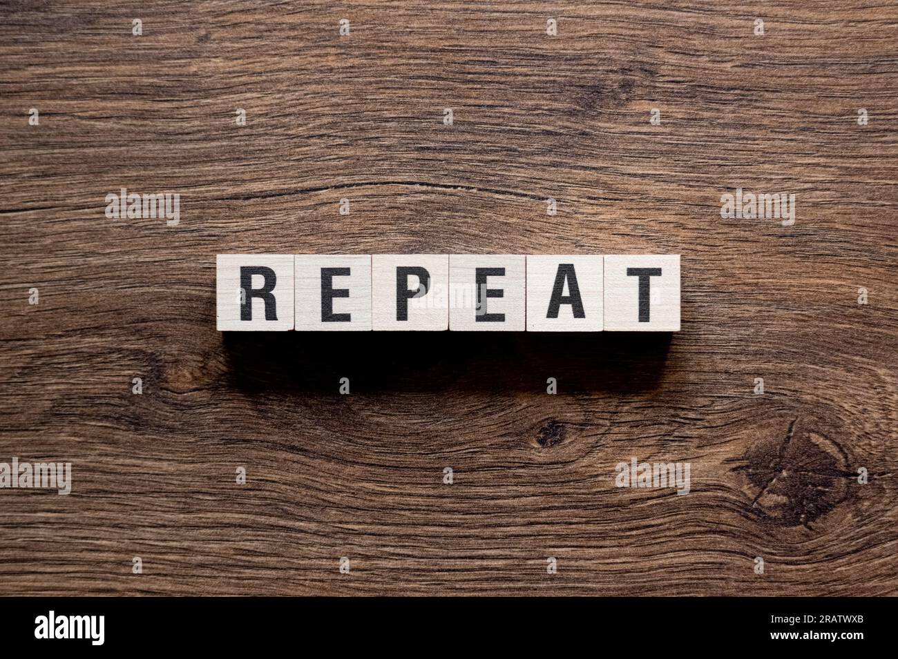 Repeat Word Concept On Building Blocks Text Letters Stock Photo Alamy