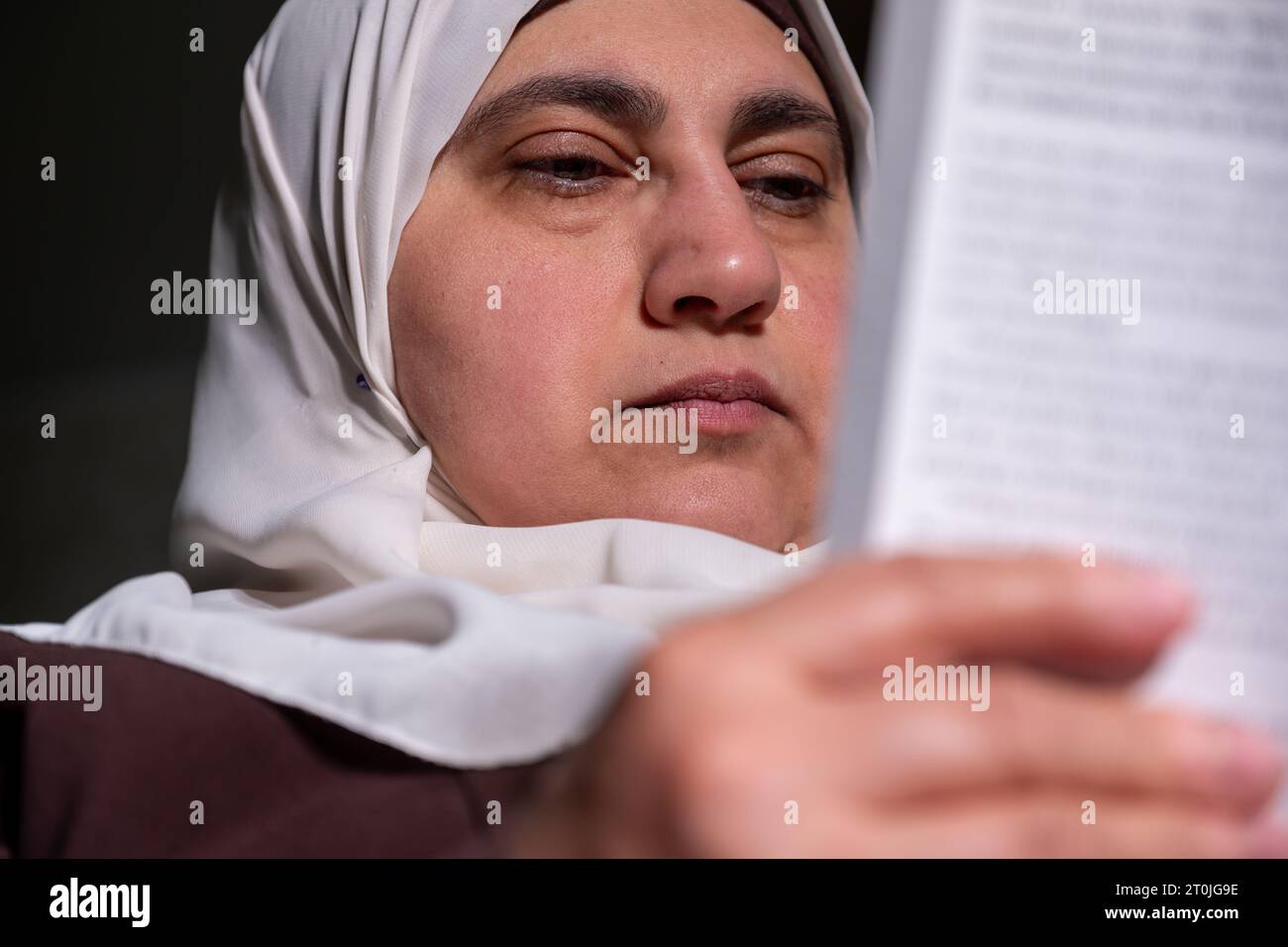 Muslim Female Wearing Hijab Reading Book Stock Photo Alamy