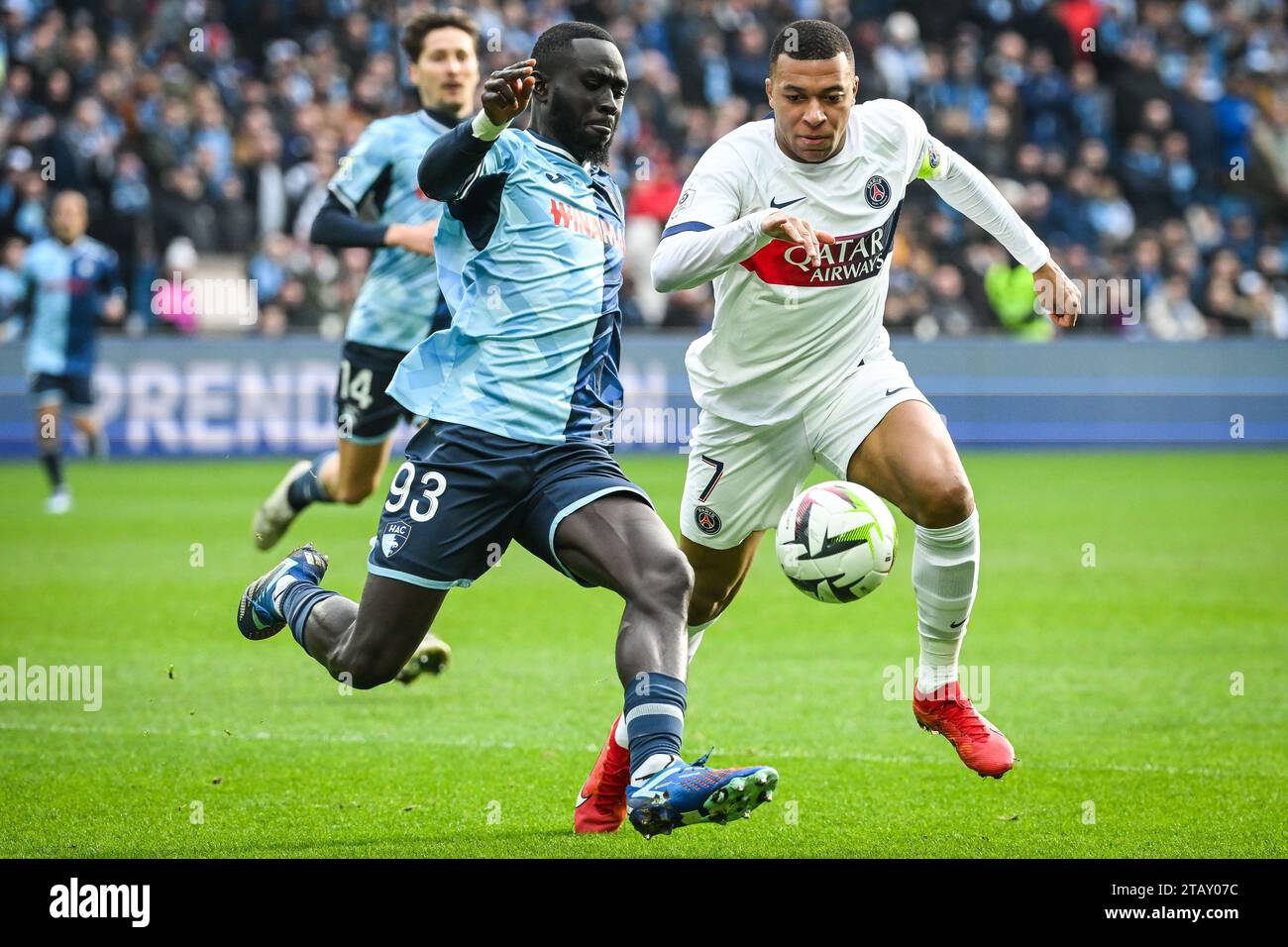 Arouna Sangante Of Le Havre Ac And Kylian Mbappe Of Psg During The