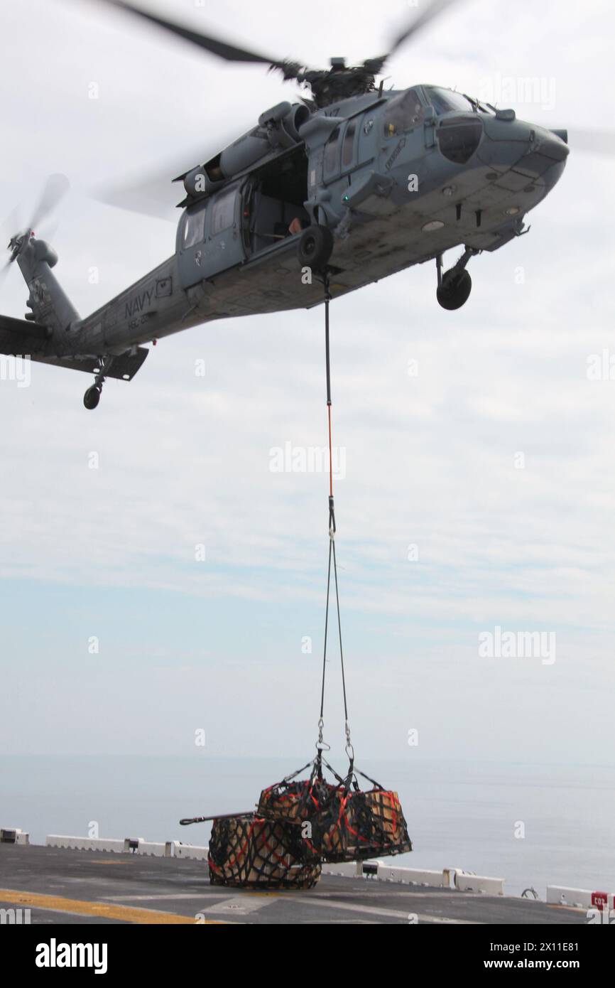 A Navy MH 60S Night Hawk From Helicopter Sea Combat Squadron 22 Lifts