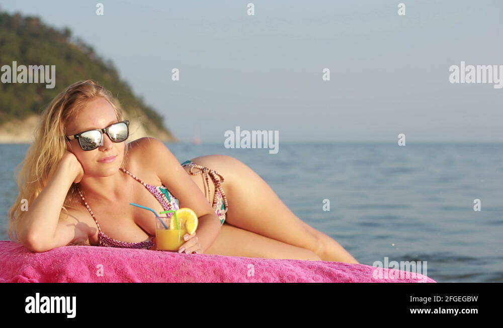 Girl In Bikini Drink Juice Through A Straw Woman At The Sea Stock