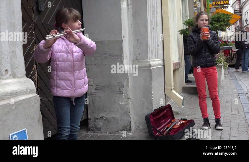 Money Coins And Girl Play With Flute Fife Pipe In Street 4K Stock