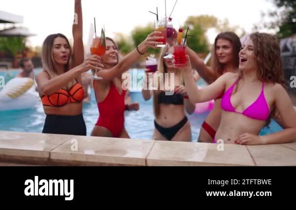 Girls In Bikini Have Pool Party With Cocktails In Swimming Pool Women