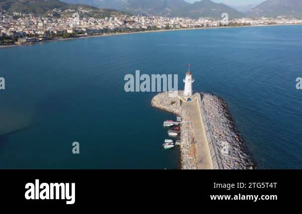 Lighthouse In The Port Of Alanya Turkey Seaport Bay View From The Sea