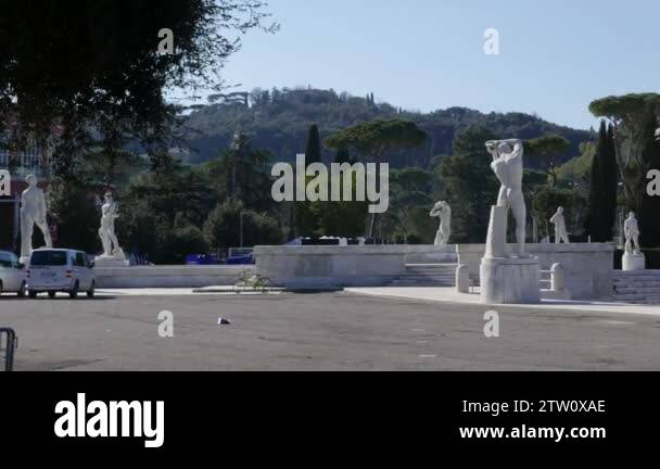 ROME ITALY FEBRUARY 11 2018 Marble Statues Of Naked Male Athletes In The Fascist Era Stadio