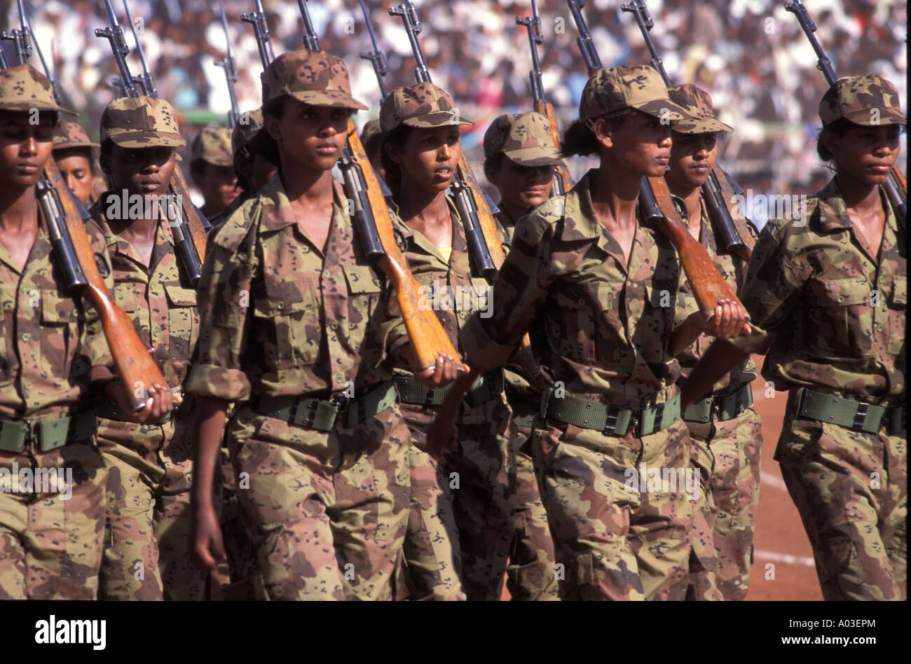 stock-image-of-eritrean-women-soldiers-marching-on-parade-and-in-camouflage-AEPM