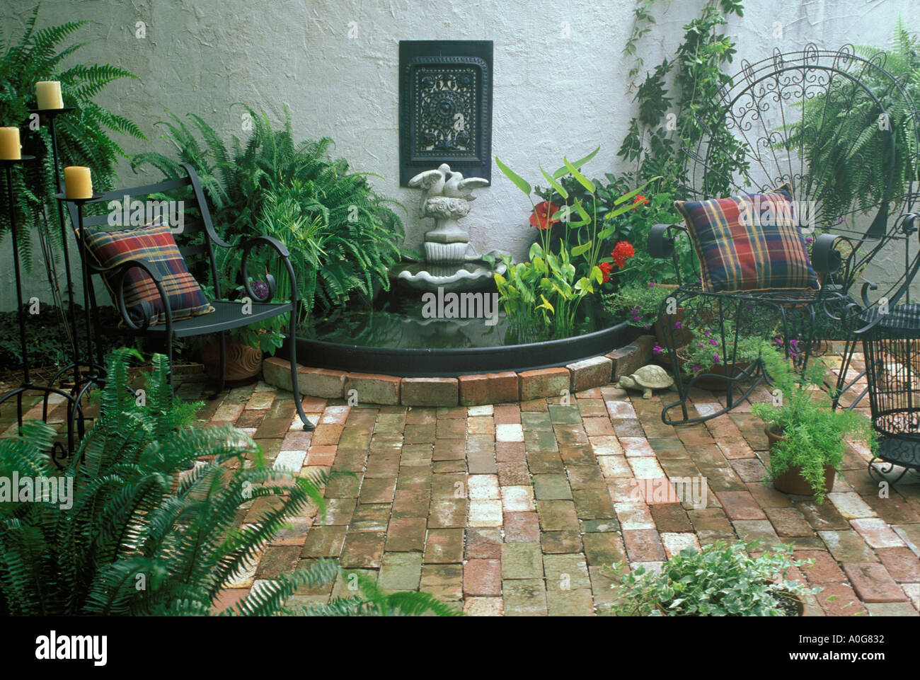 private enclosed brick courtyard with stucco wall, decorative pool private enclosed brick courtyard with stucco wall, decorative pool