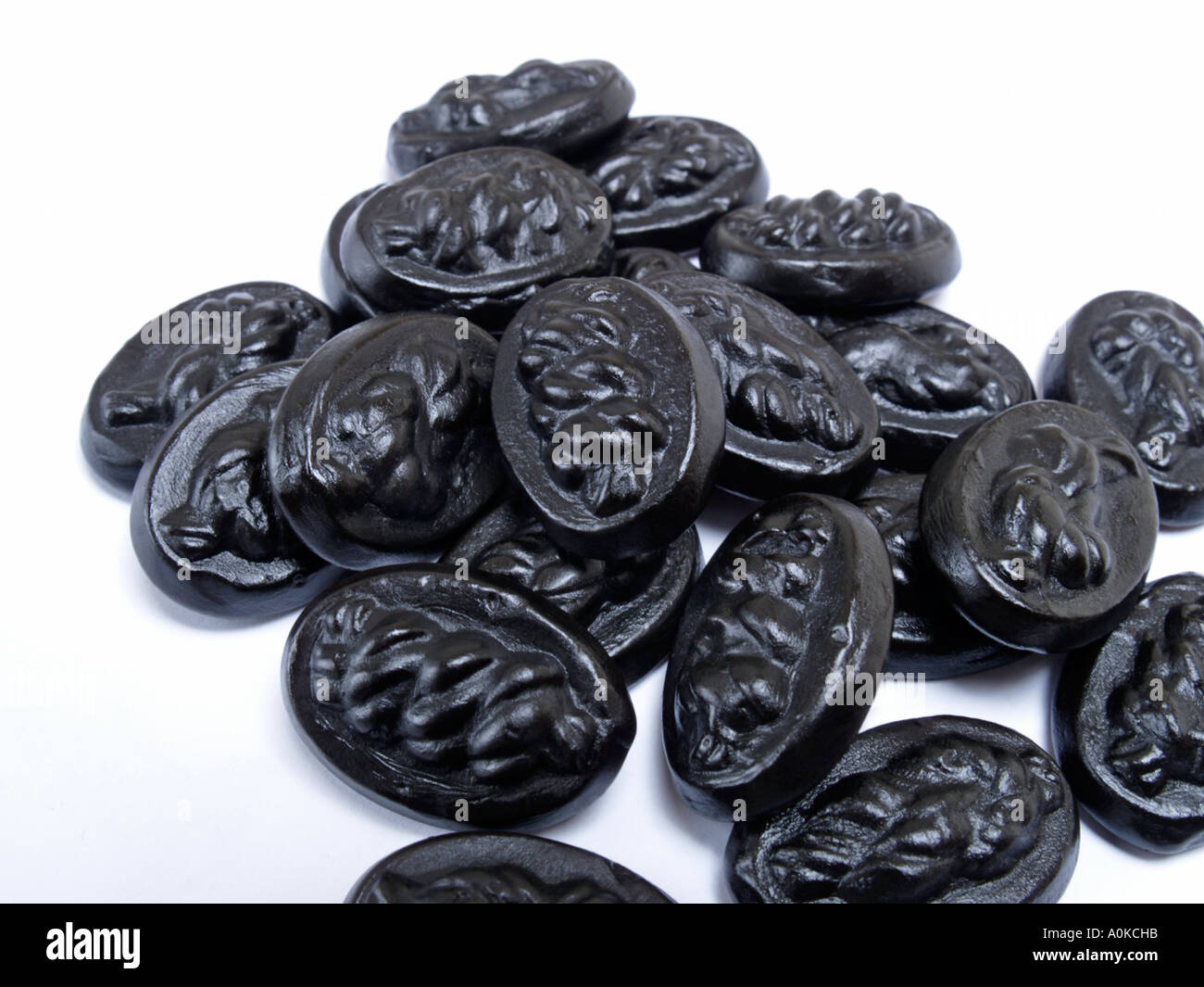 Typical Dutch black Liquorice candies sweets called dropjes Stock Photo