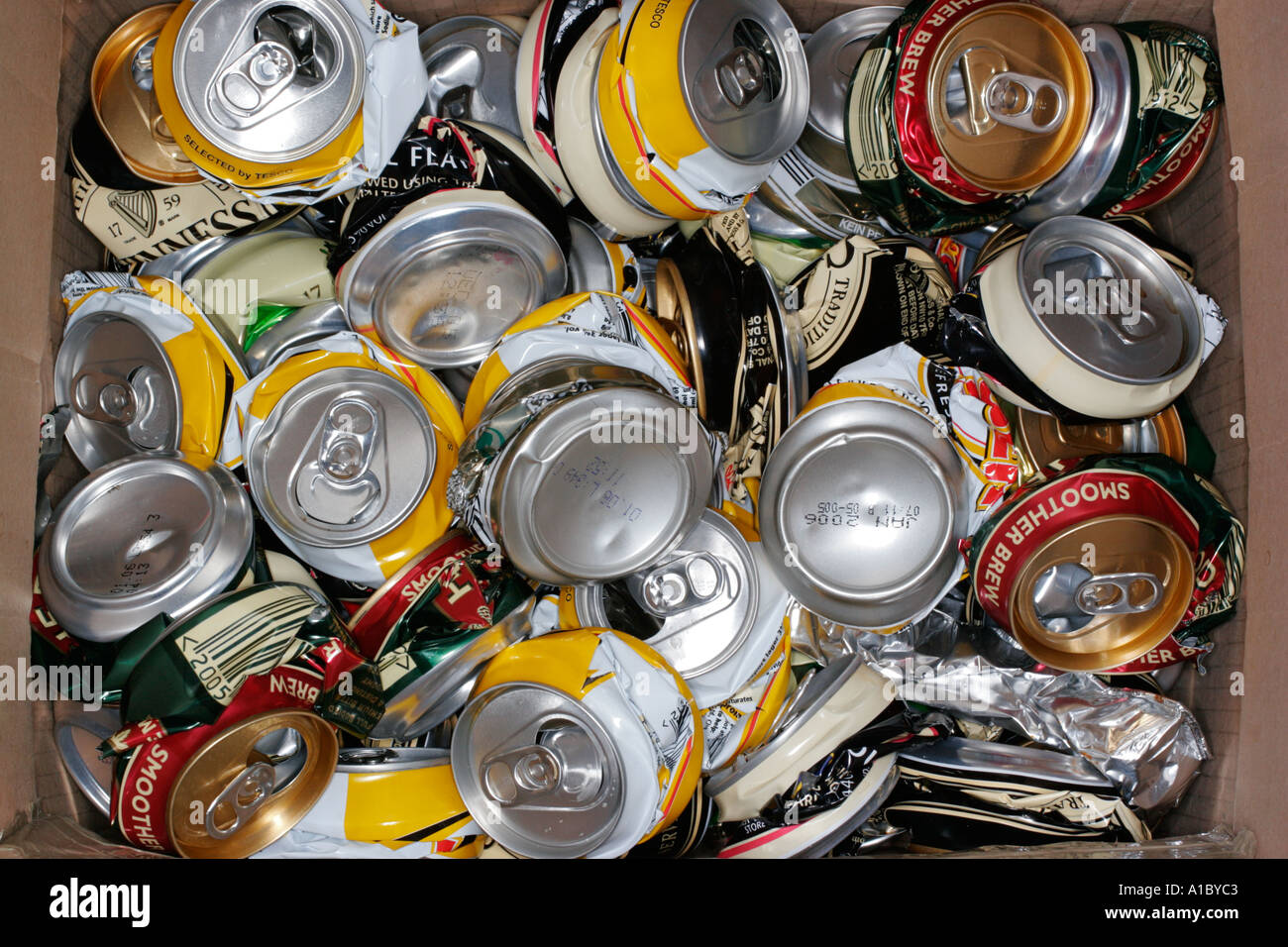 Crushed drink beer cans ready to be recycled tin steel aluminium Stock