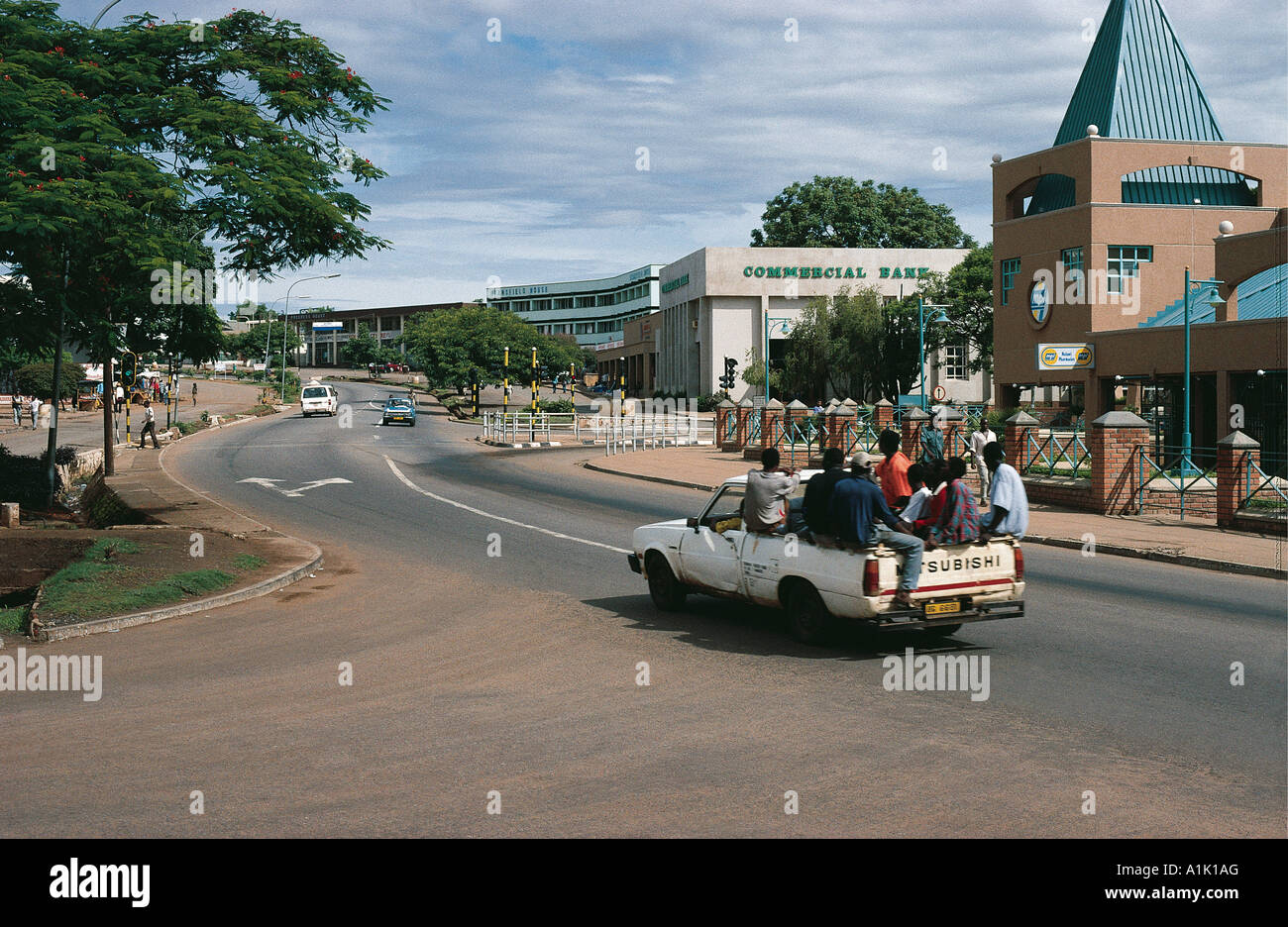 a-road-in-lilongwe-old-town-in-malawi-a-pick-up-is-driving-past-stock-photo-royalty-free-image