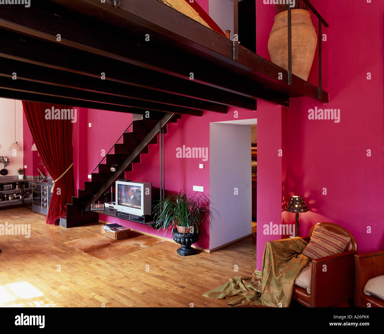 view of a living room painted with magenta color stock photo view of a living room painted with magenta color stock photo