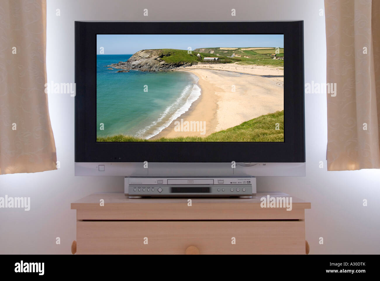 flat panel lcd television monitor fixed to bedroom wall showing flat panel lcd television monitor fixed to bedroom wall showing