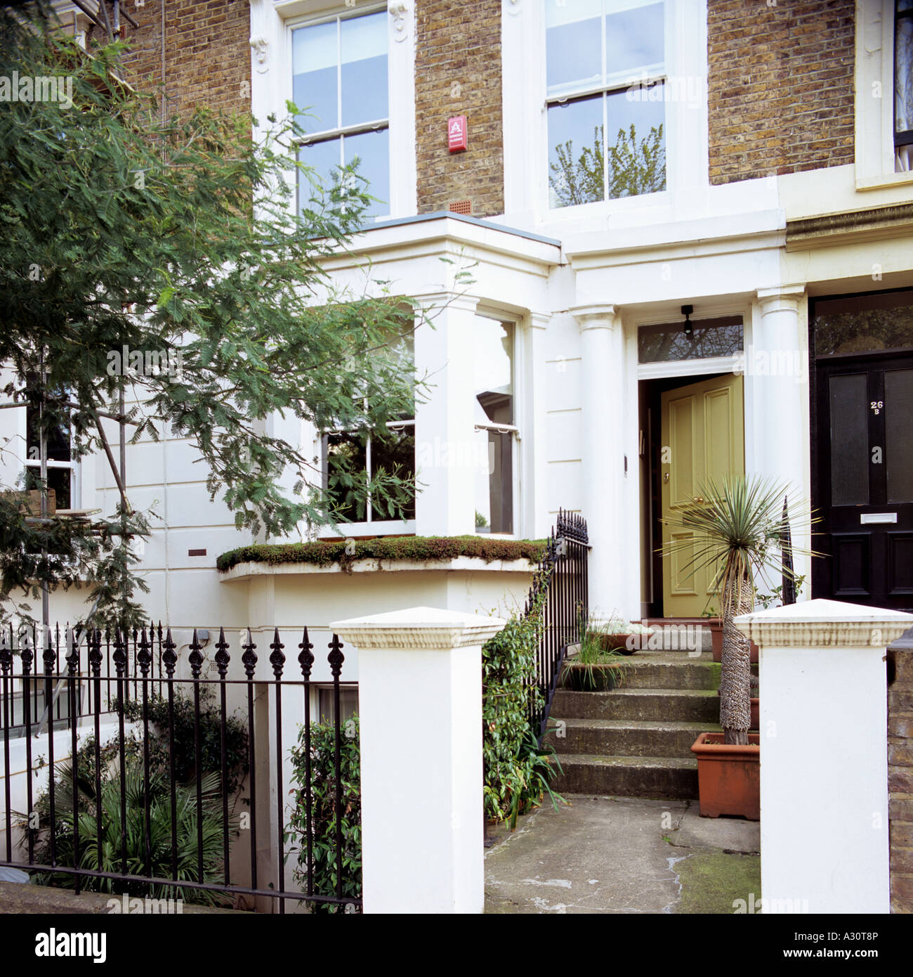 entrance to a terraced Victorian house in London Stock Photo, Royalty