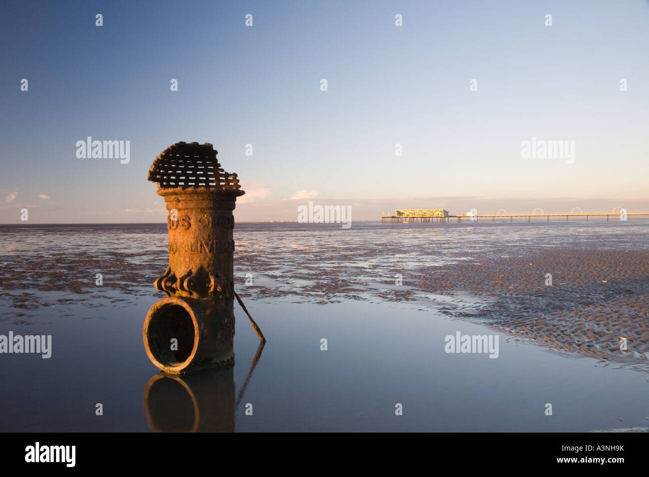 "LIVERPOOL FLEETWOOD TIDAL STANDARD" Cast iron sewage outfall pipe Stock Photo, Royalty Free