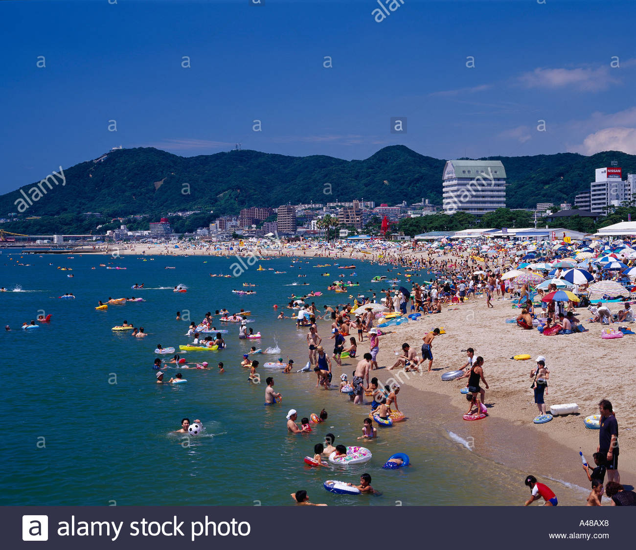 Beach Ball In Water sea beach sandy beach water s edge rubber ring beach ball sky blue Beach Ball In Water sea beach sandy beach water s edge rubber ring beach ball sky blue