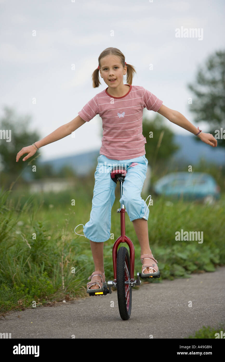 Girl riding a unicycle Stock Photo, Royalty Free Image 10978376 Alamy