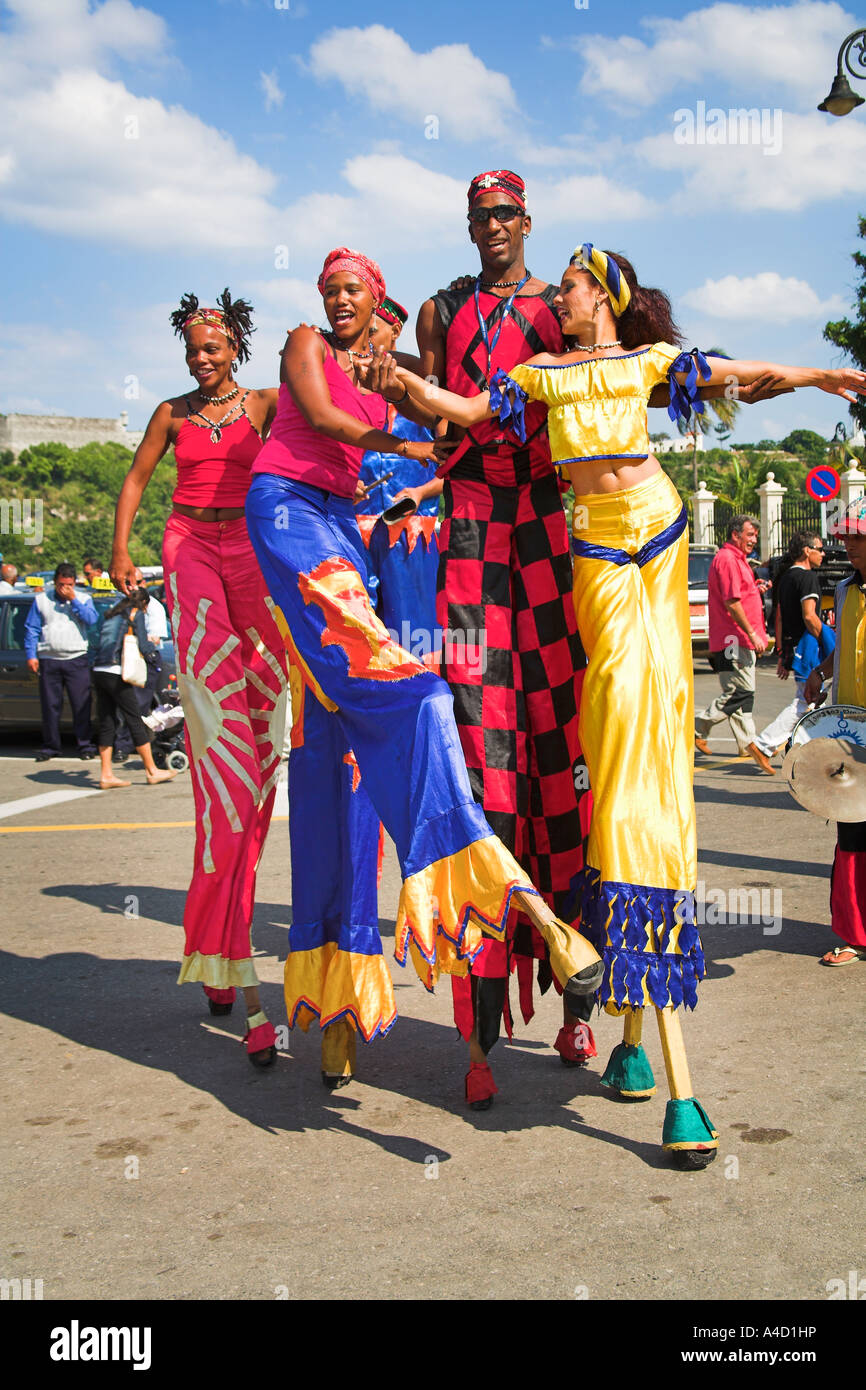 Four young people on stilts, Artisans Market near Plaza de Armas Stock