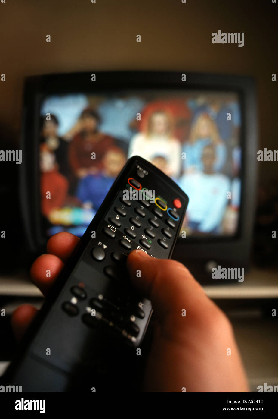 hand-holding-tv-remote-control-with-tele
