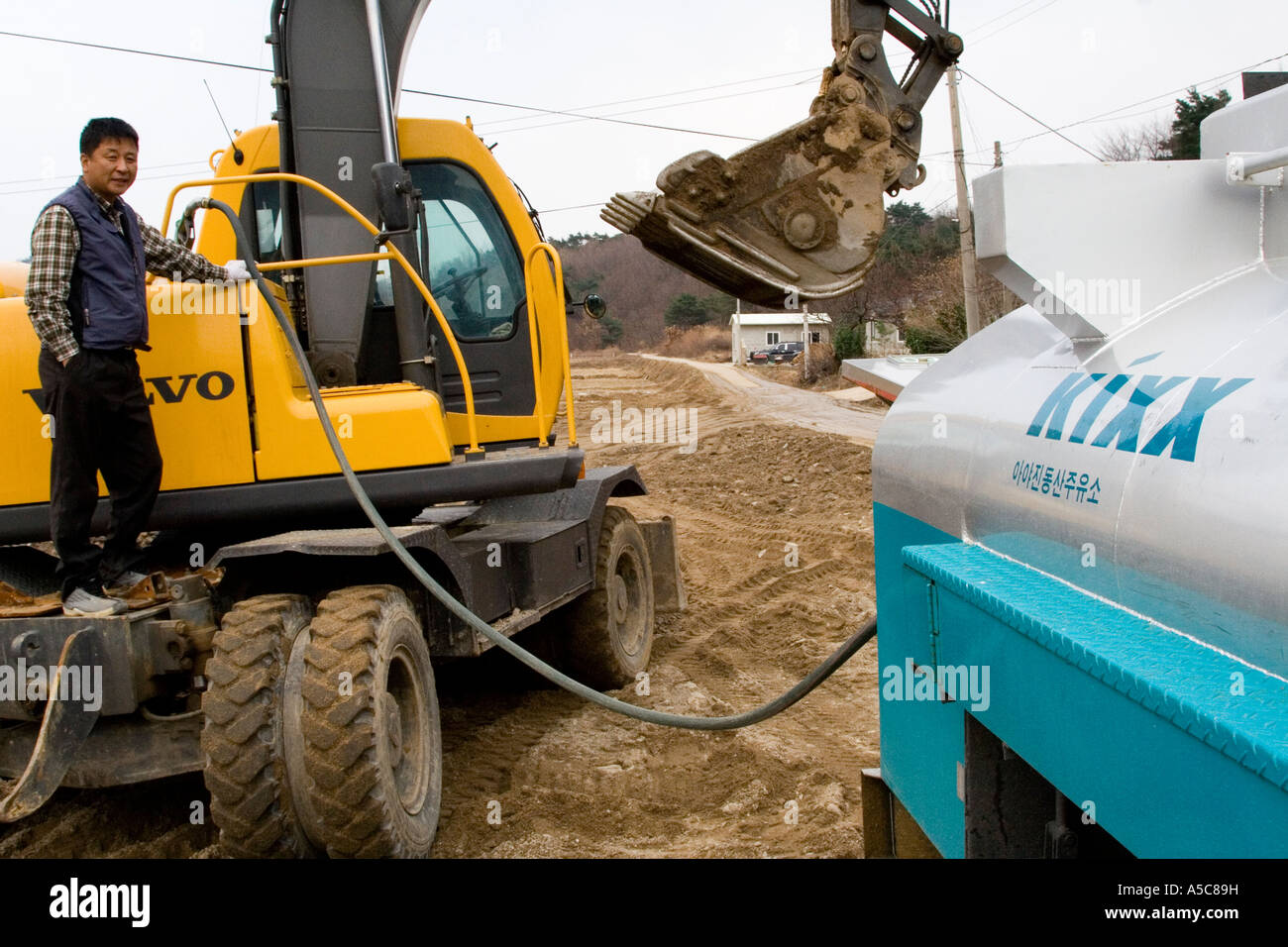 Gas Truck Refueling Construction Scoop Near Sokcho South Korea Stock