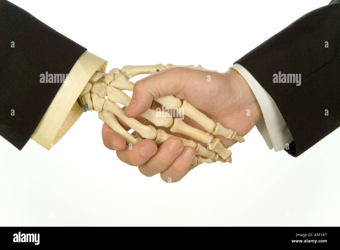 skeleton-hand-in-suit-shaking-hands-with-business-man-A5F1R7.jpg