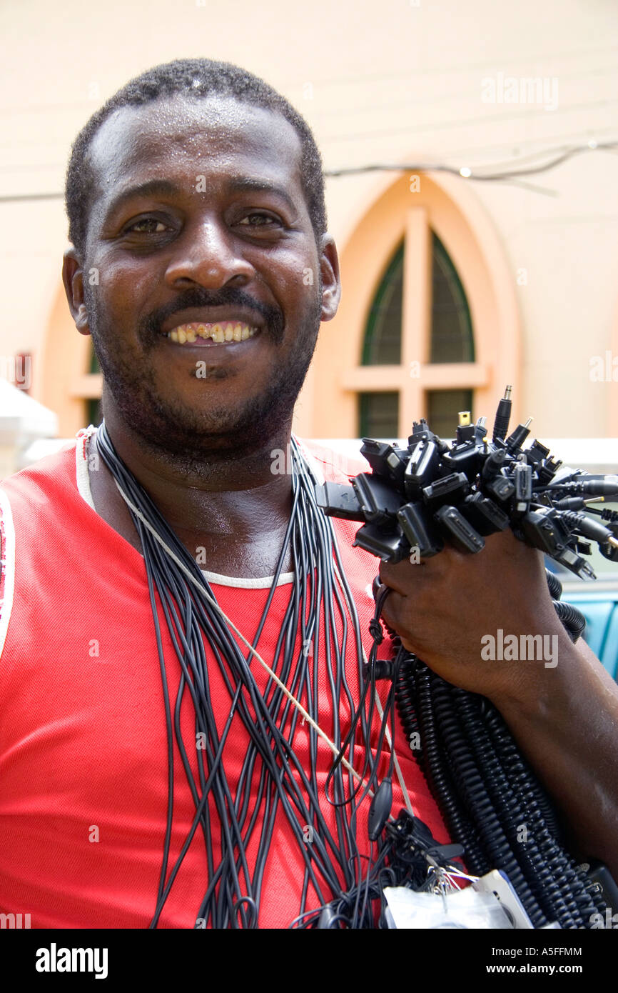 Stock Photo - Street vendor in Rio de Janeiro Brazil selling power cords for mobile telephones - street-vendor-in-rio-de-janeiro-brazil-selling-power-cords-for-mobile-A5FFMM