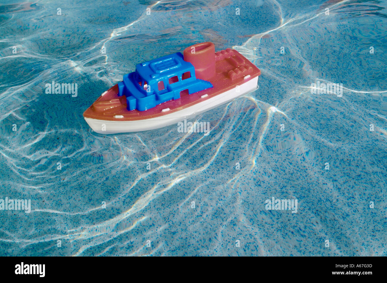 Toy Plastic Boat In Swimming Pool Water Toys Boats Boating Stock Photo